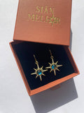Large star huggie hoop earrings