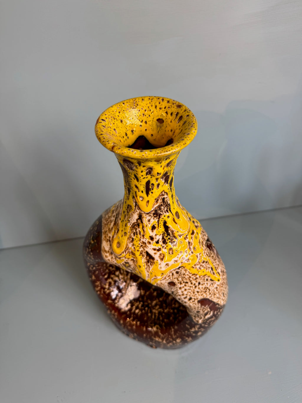 Large brown yellow vase with hole