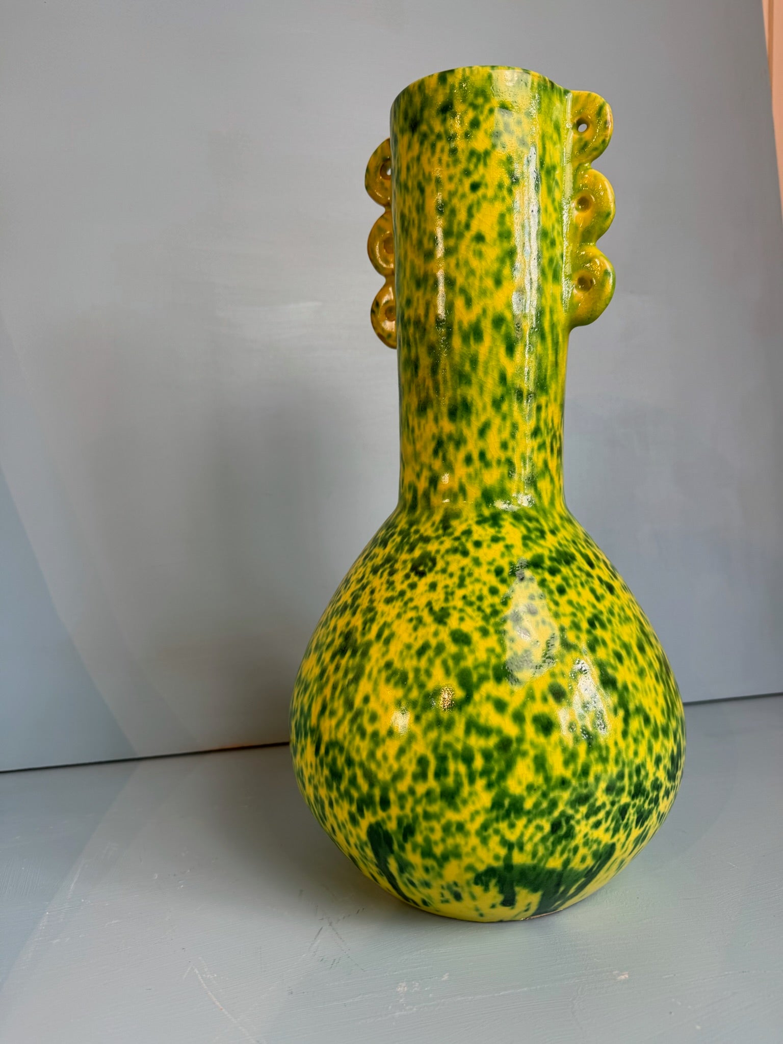 Yellow green splatter vase with wider neck