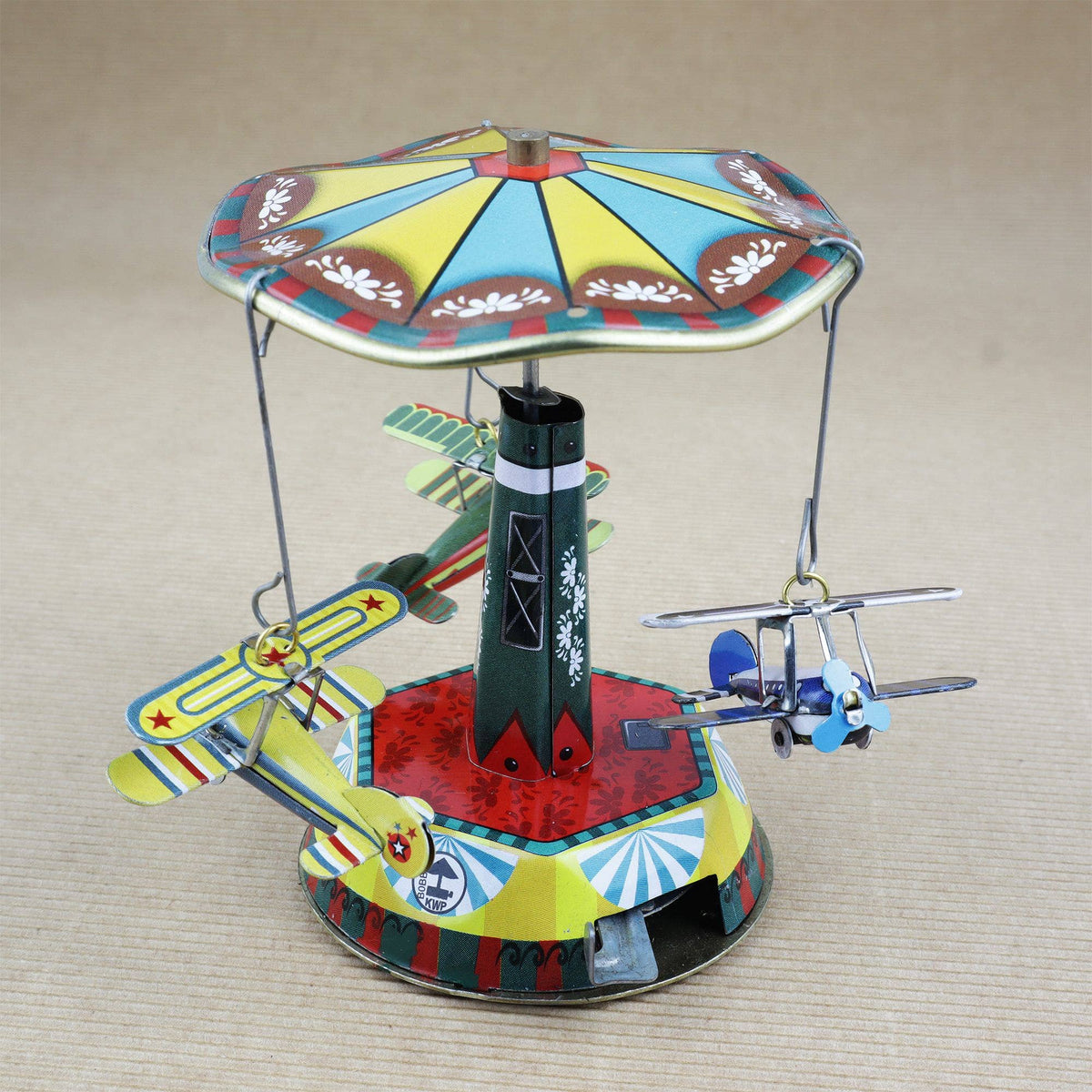 Tin toy carousel airplanes biplane