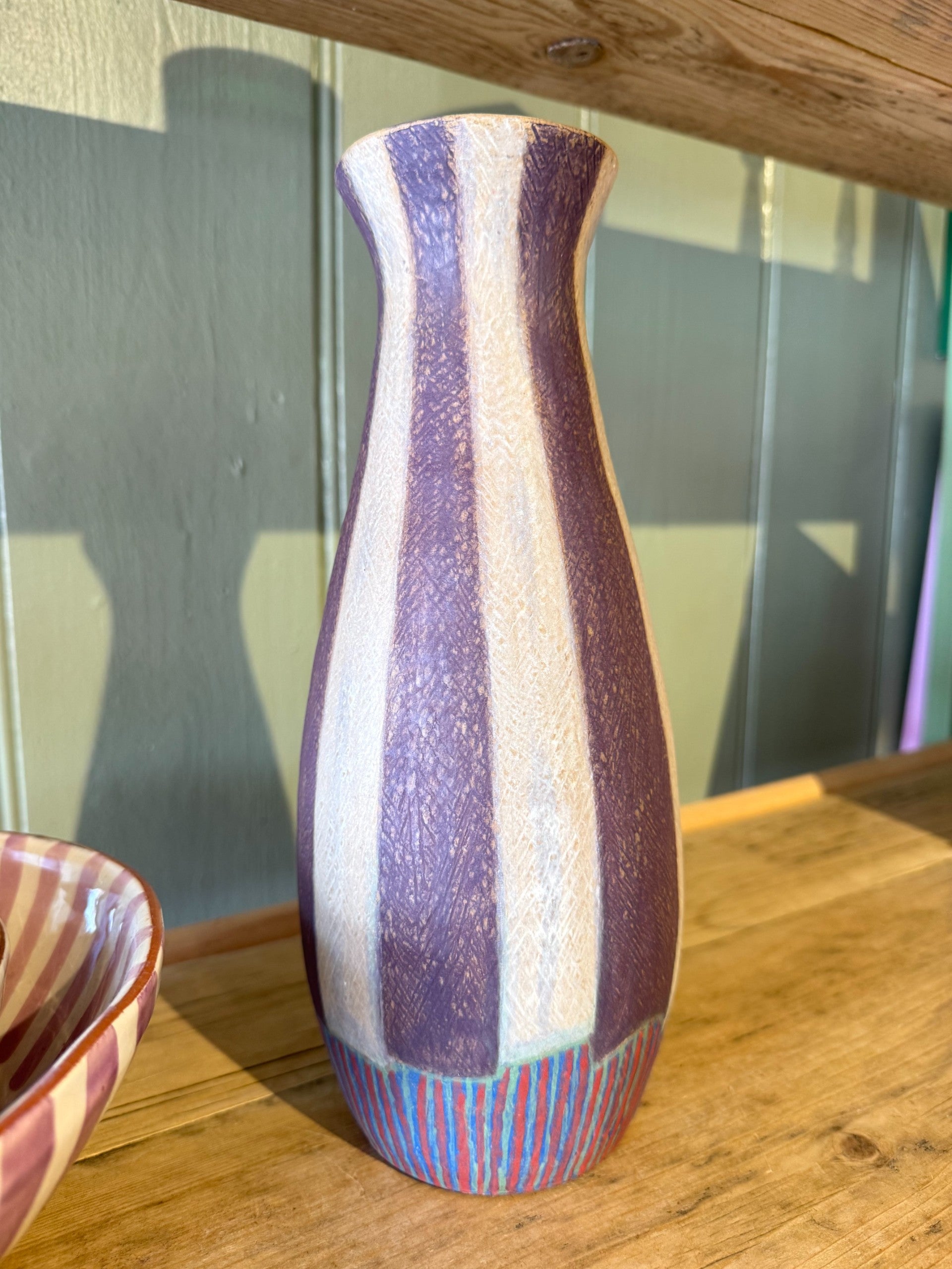 Striped vintage pottery vase