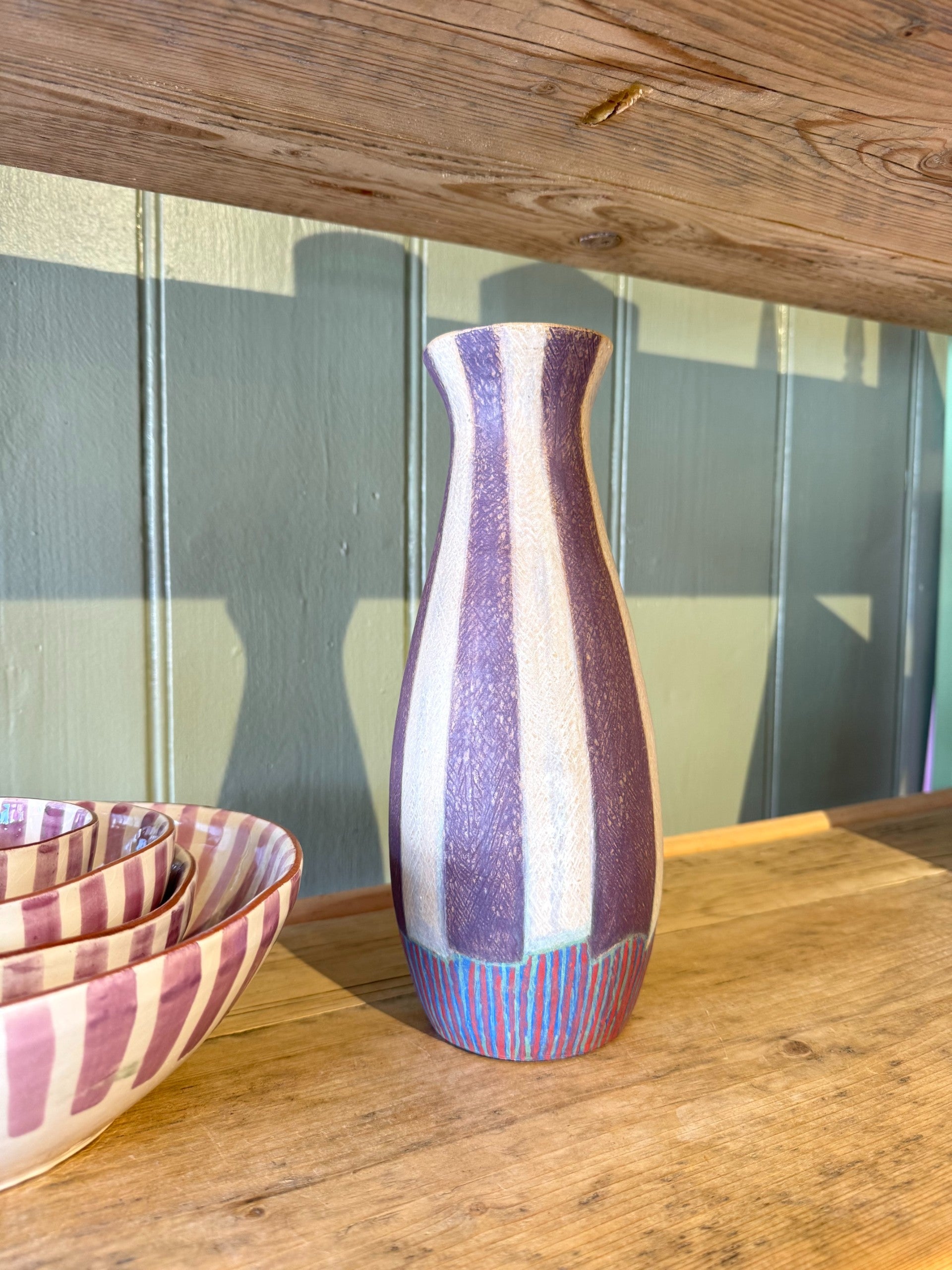 Striped vintage pottery vase