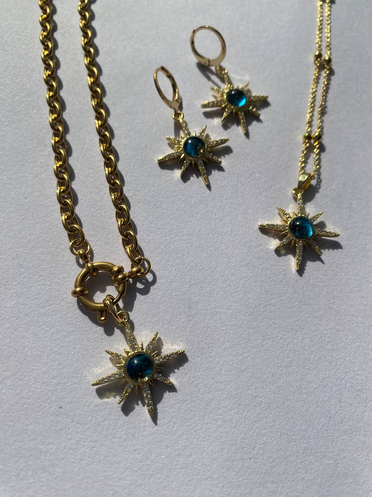 Large star huggie hoop earrings