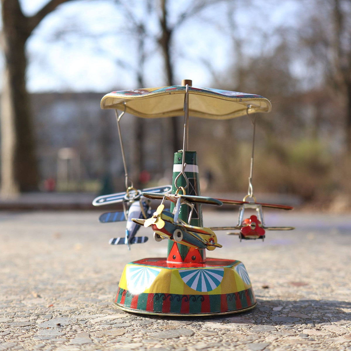 Tin toy carousel airplanes biplane
